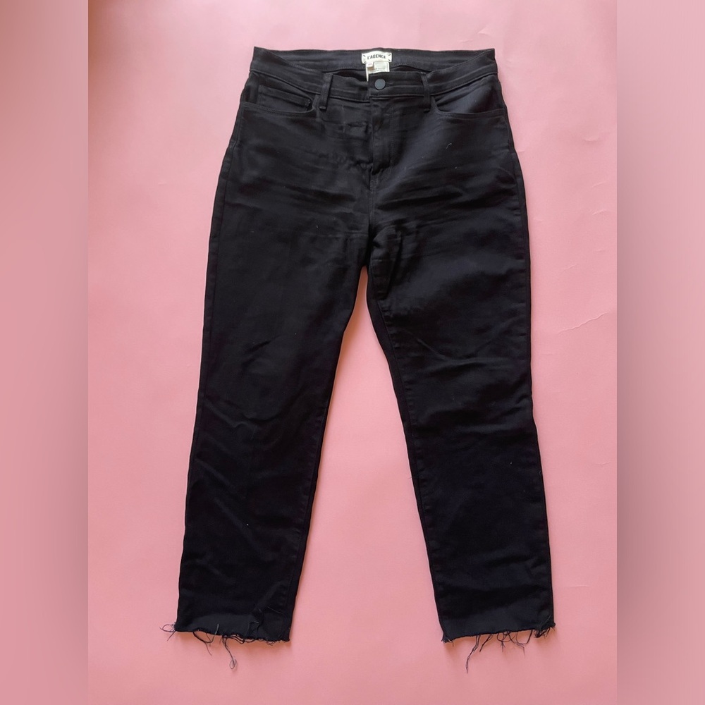 L’AGENCE super soft black jeans with distressed bottom made of 93% cotton.
